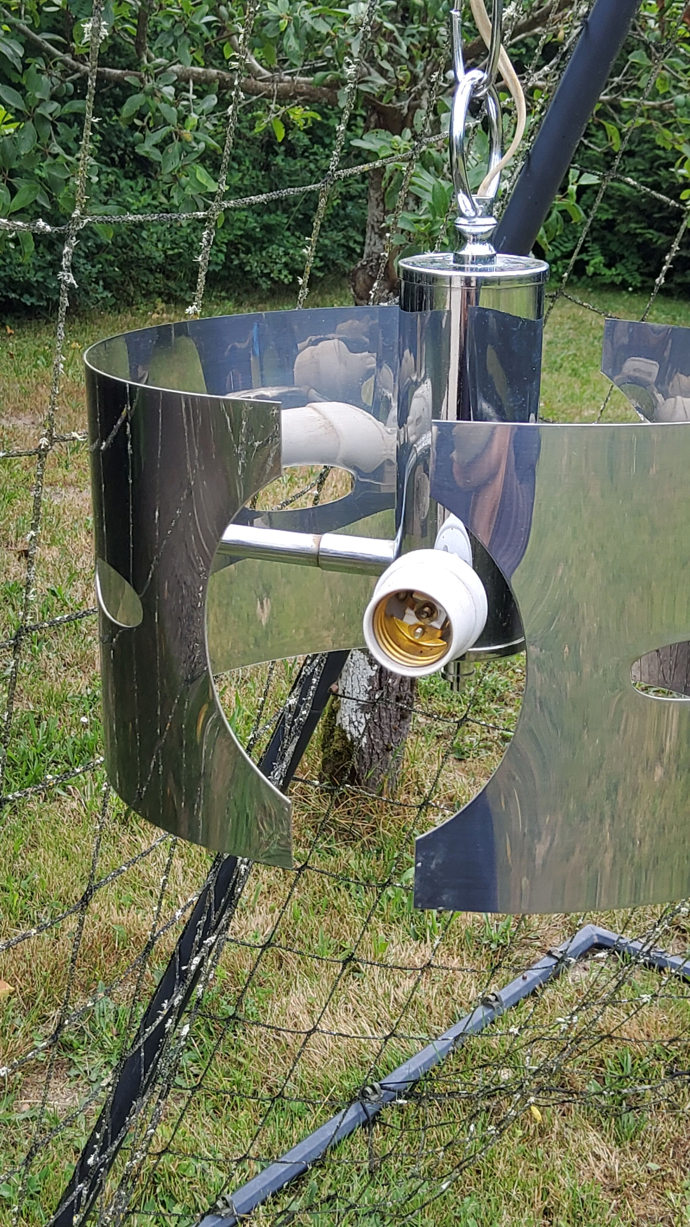Design chandelier of the 70s in chromed metal
