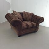 Large weighty love seat with the original matching cushions. Marked "Handmade in Holland"