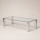 Table basse moderniste en acier chromé et verre clair — Europe, vers 1970