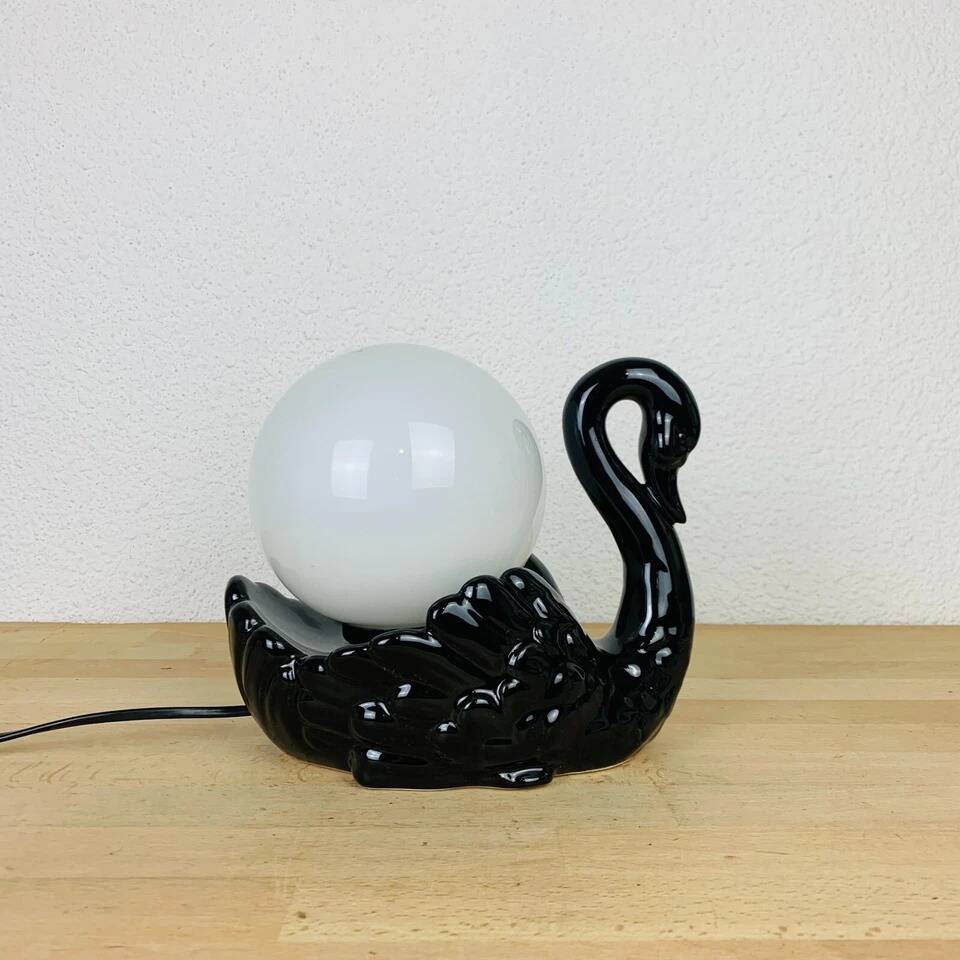 Black ceramic swan lamp with vintage opaline globe