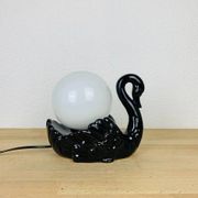 Black ceramic swan lamp with vintage opaline globe