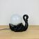 Black ceramic swan lamp with vintage opaline globe