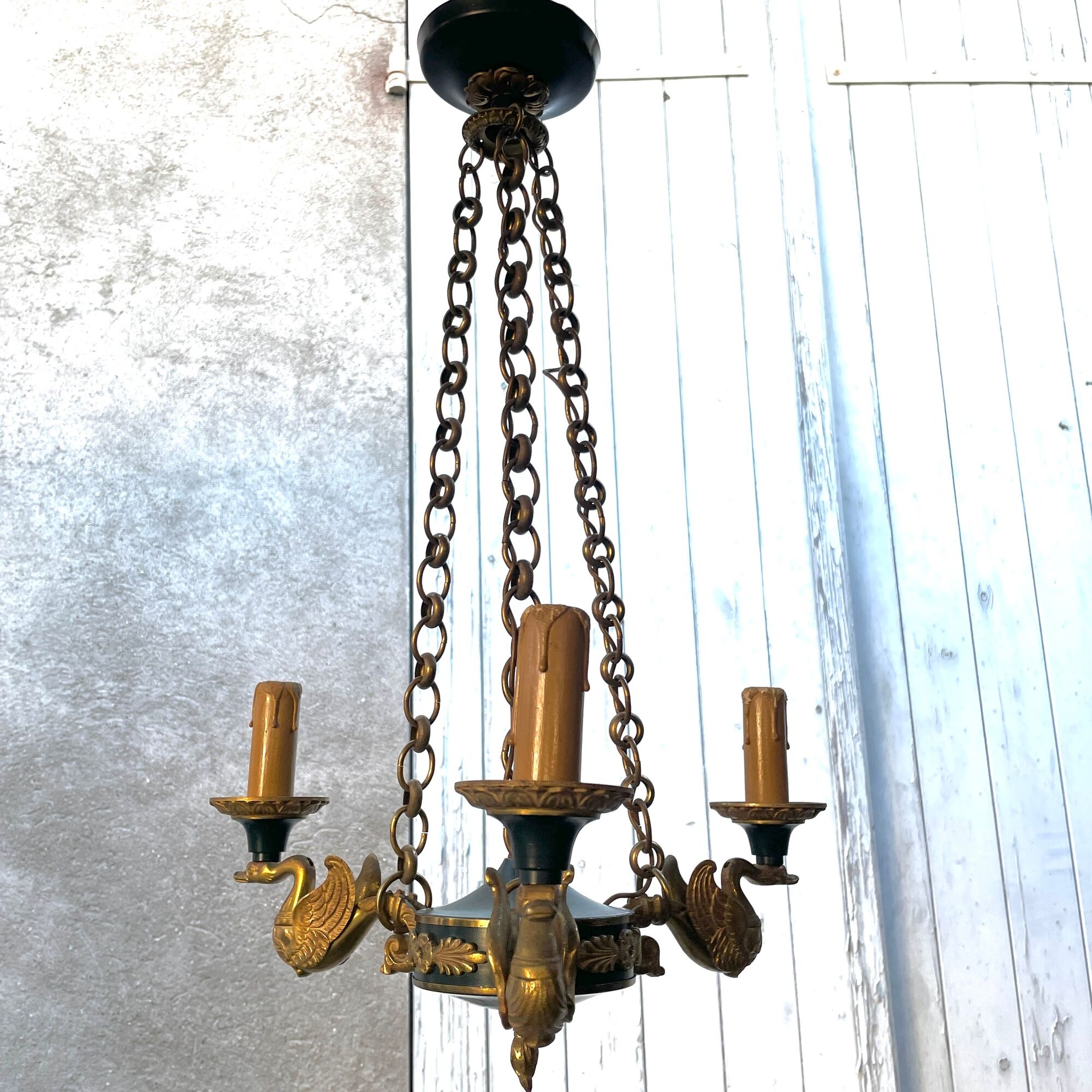Lucien gau chandelier pendant lamp in bronze with swan decoration.