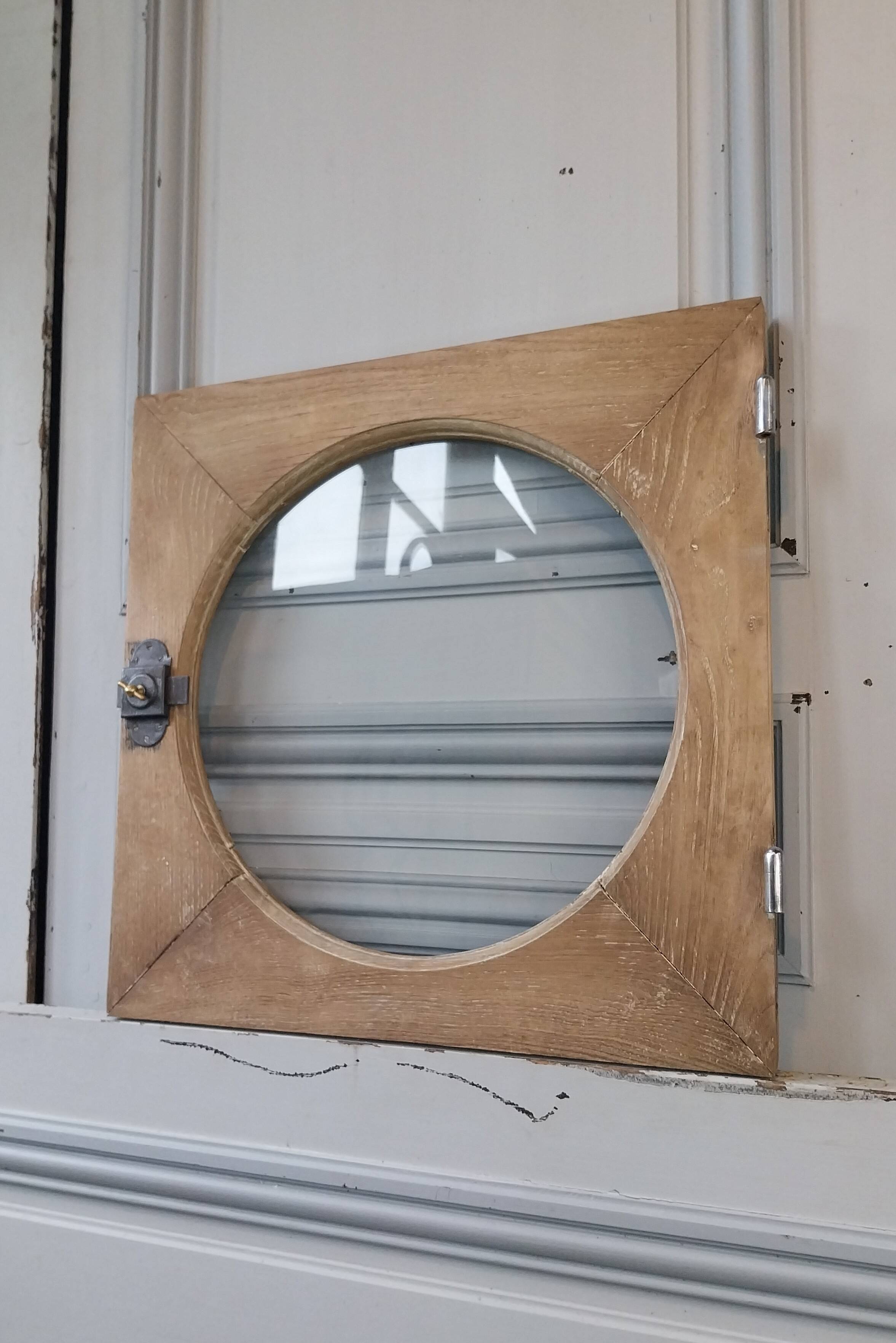 Old bull's-eye window