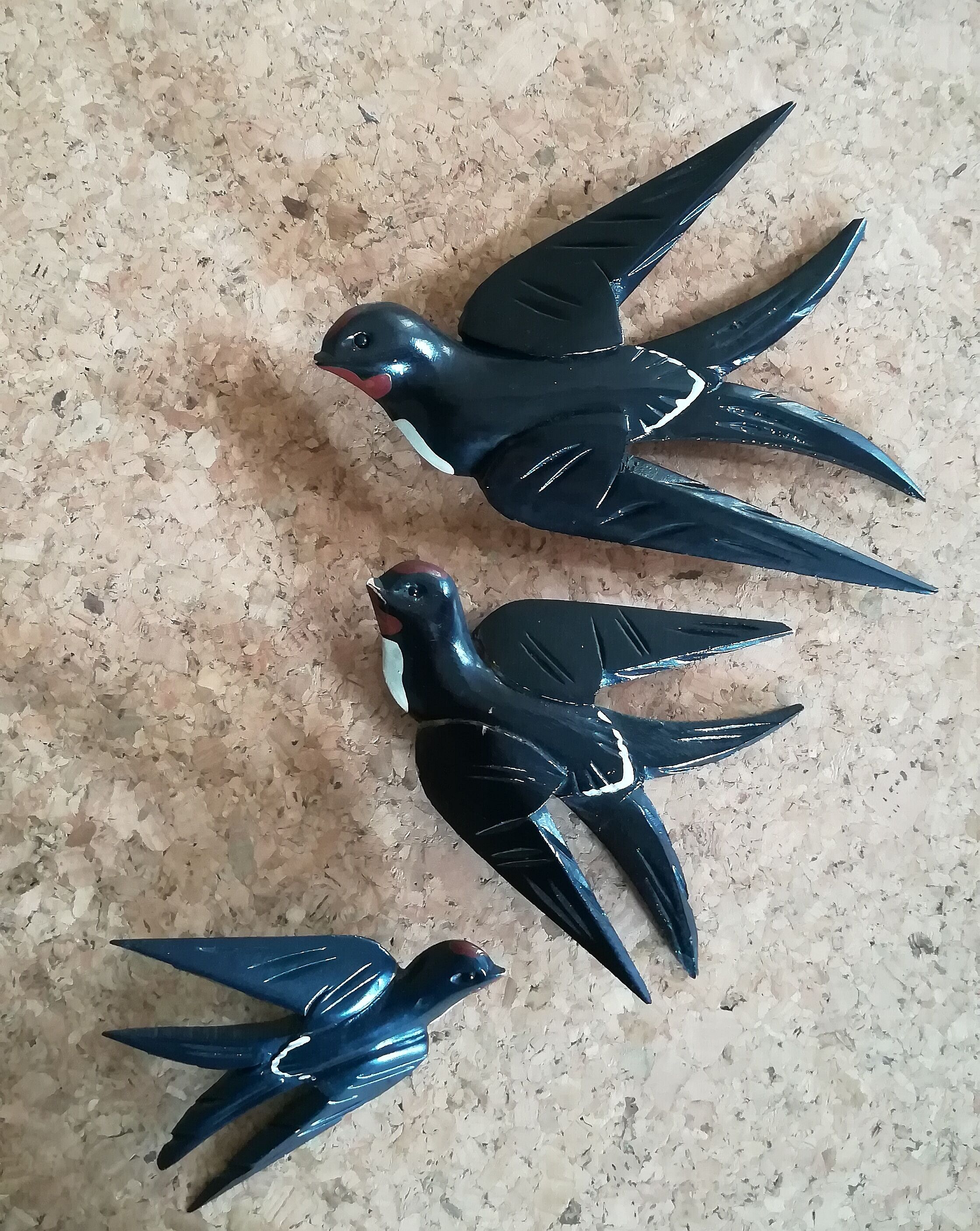 Three old wooden wall swallows