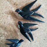 Three old wooden wall swallows