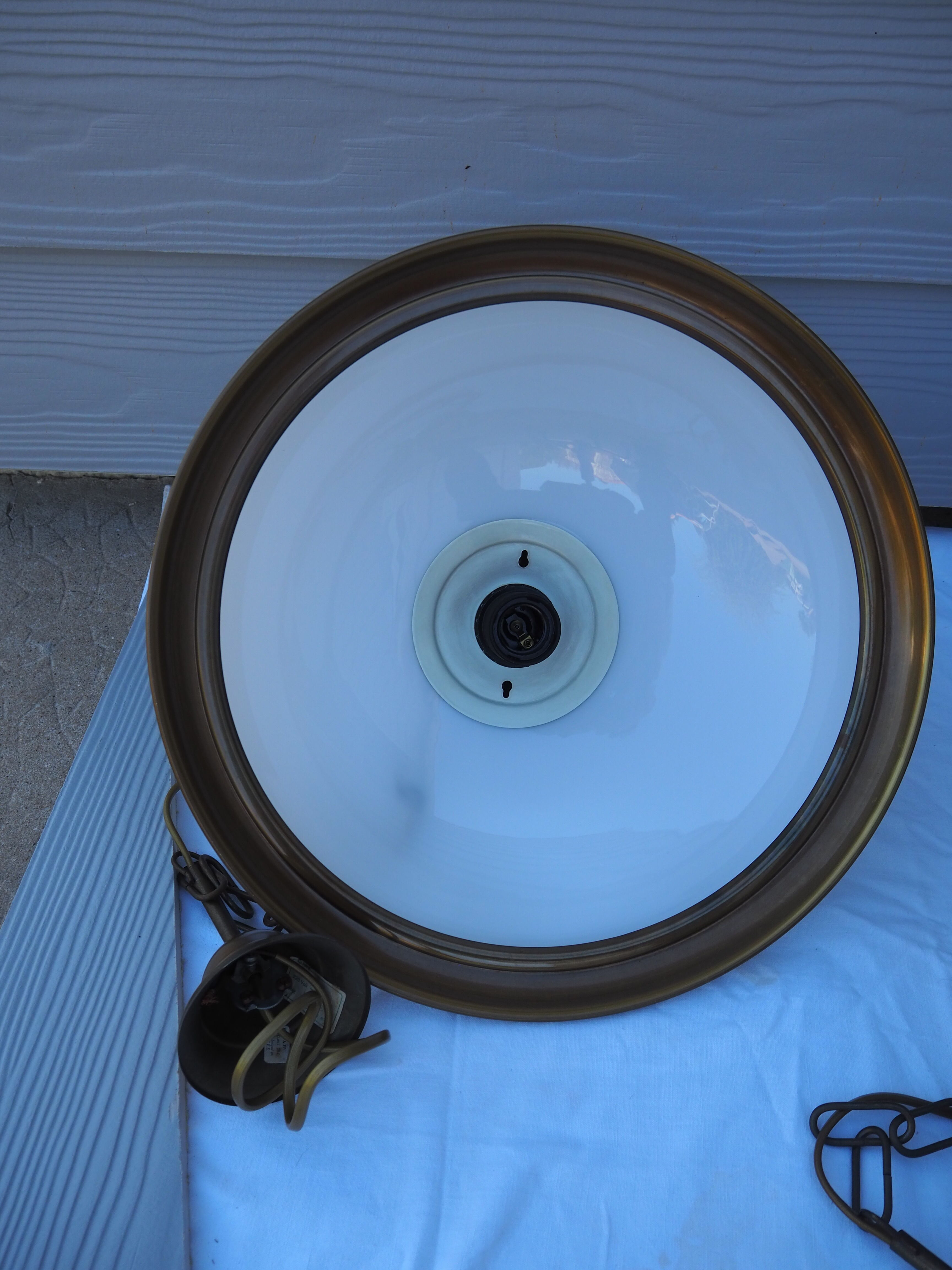 Suspension in white opaline, its edge in aged brass