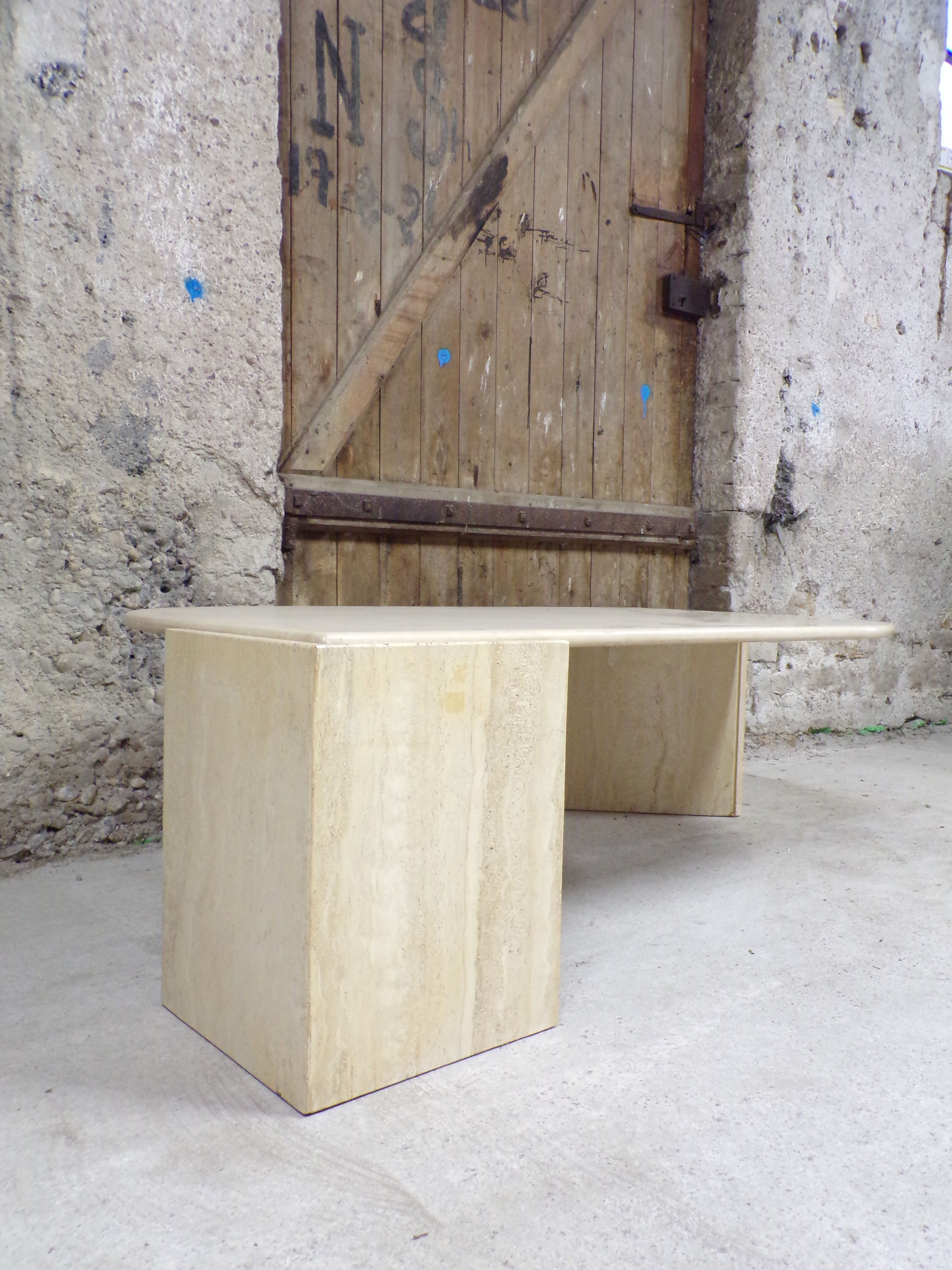 Table basse oeil en travertin 77X127 cm