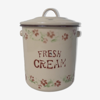 Old fresh cream pot in enamelled steel