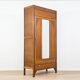 Art Deco wardrobe in carved wood with mirror from the 1930s.