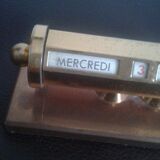 Ancient brass turnstile calendar