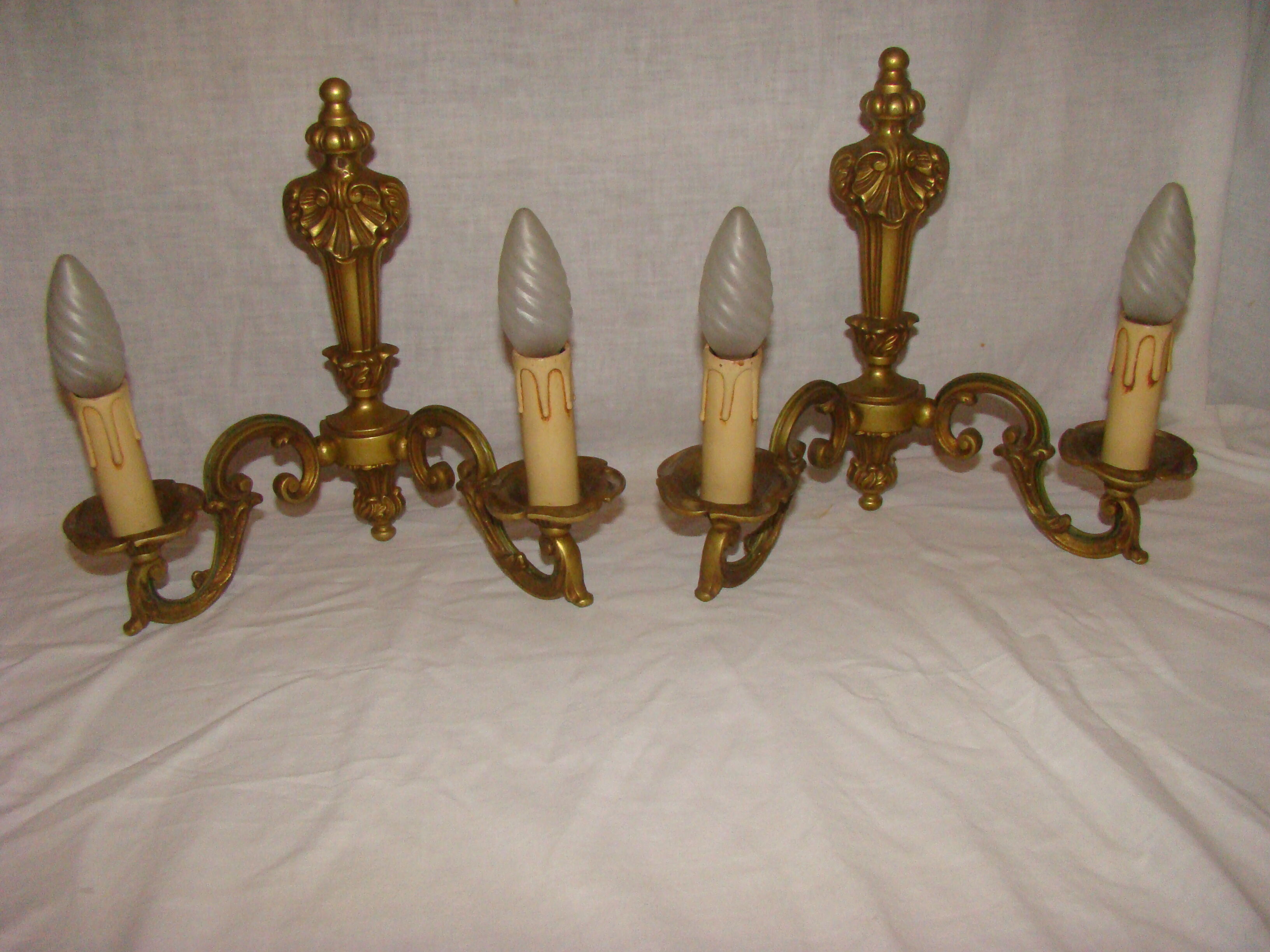 pair of bronze wall lights with 2 arms