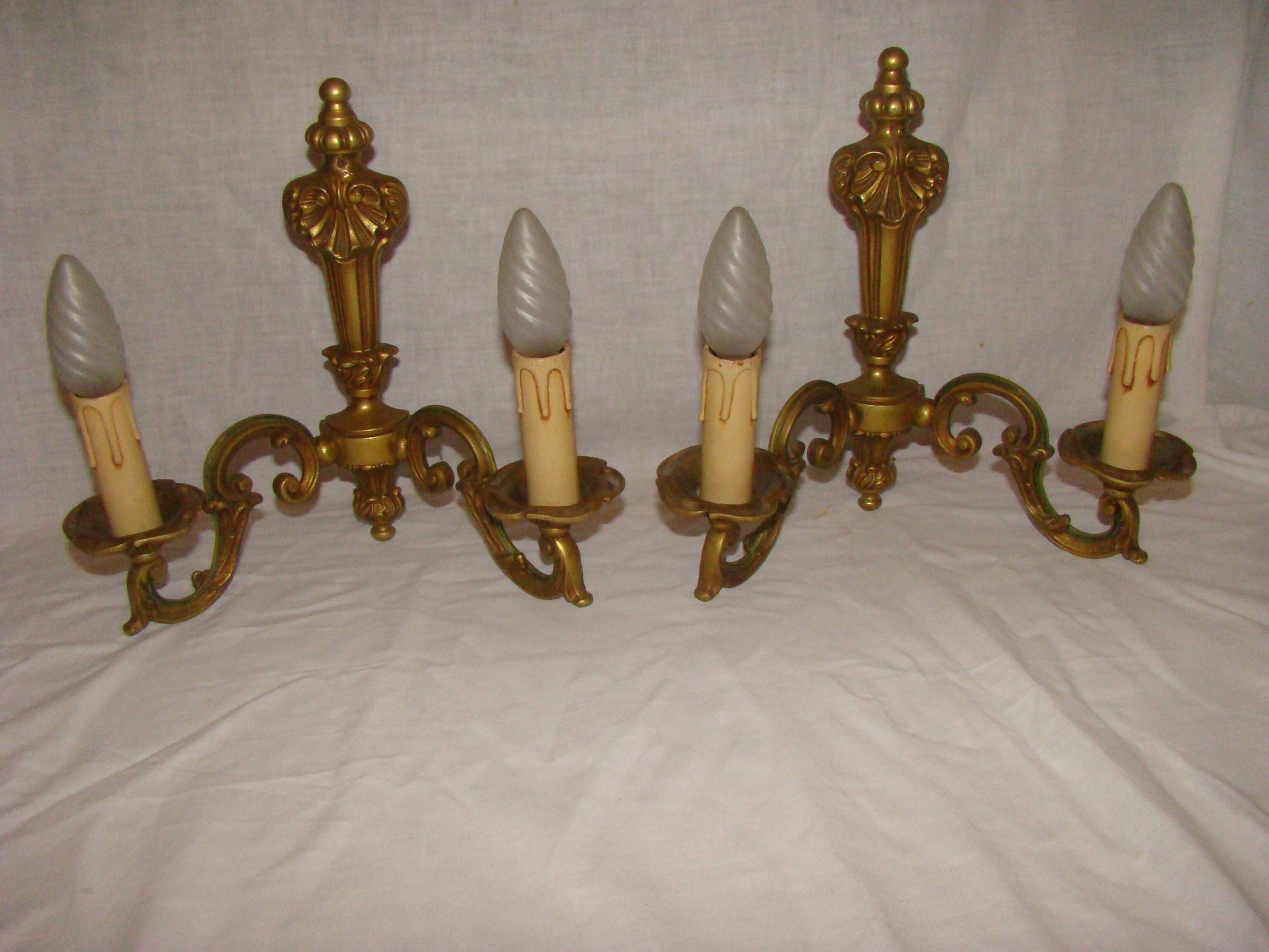 pair of bronze wall lights with 2 arms