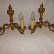 pair of bronze wall lights with 2 arms