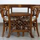 Rattan set with table and two armchairs.