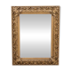 Miroir ancien dans un cadre richement décoré, France.