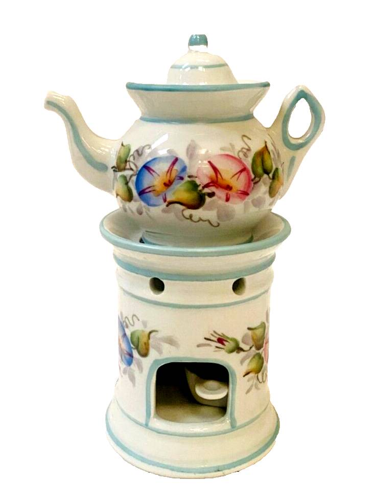 Polychrome porcelain tea pot with 20th century floral decoration