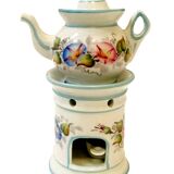 Polychrome porcelain tea pot with 20th century floral decoration