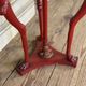 Athenian carved wood, red patina imitation of red marble