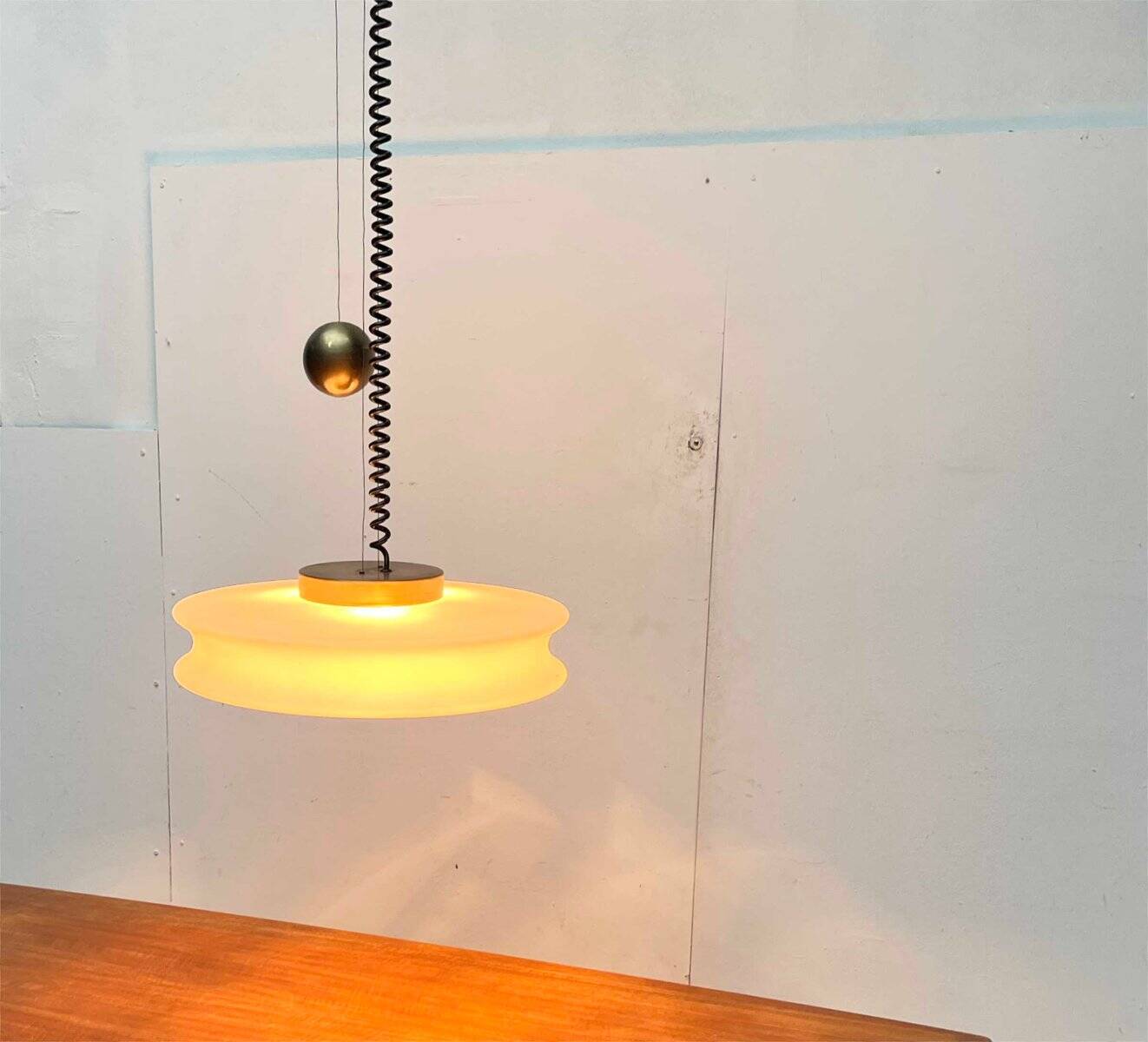 Orion counterweight pendant lamp in mid-century modern German space style, made of Staff Leuchten glass, 1960s.