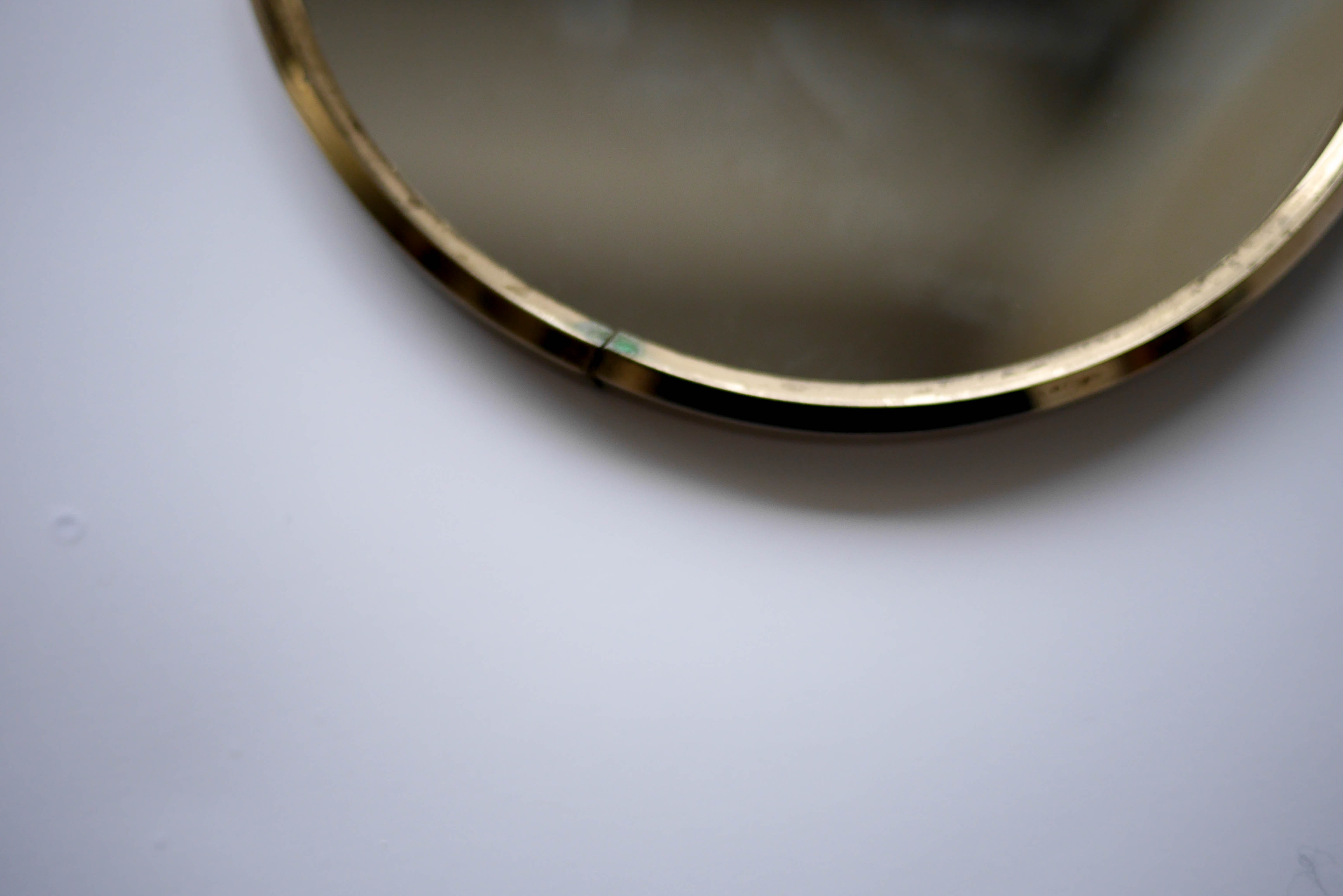 Small round magnifying mirror 14cm