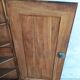 Corner cabinet in carved walnut, Savoyard style.