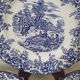 4 earthenware plates with floral and pastoral scene motif