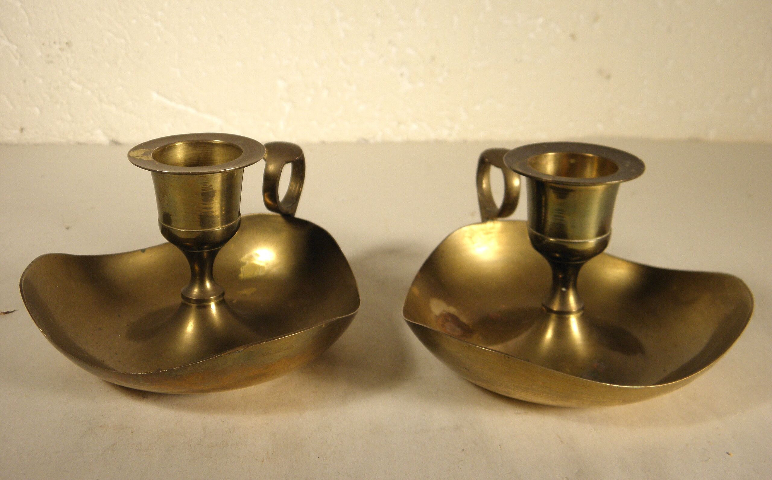 Pair of brass candle holders