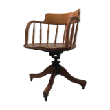 Adjustable swivel American armchair 1900