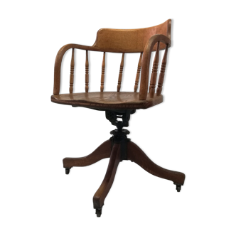 Adjustable swivel American armchair 1900