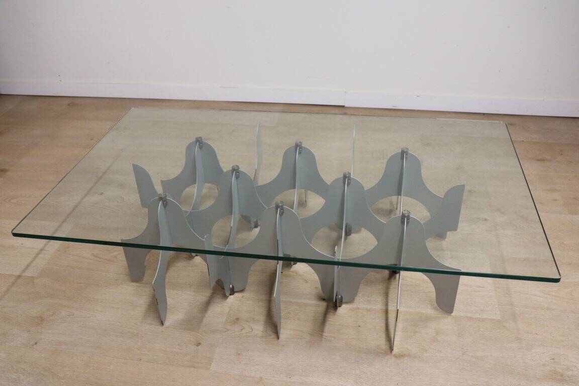Minimalist sculptural coffee table in metal and glass