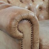 Chesterfield armchair made of cowhide leather in a light cognac colour