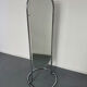 Large freestanding chrome metal full-length mirror in 1970s design.