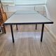Italian metal table with frosted glass top, extendable.