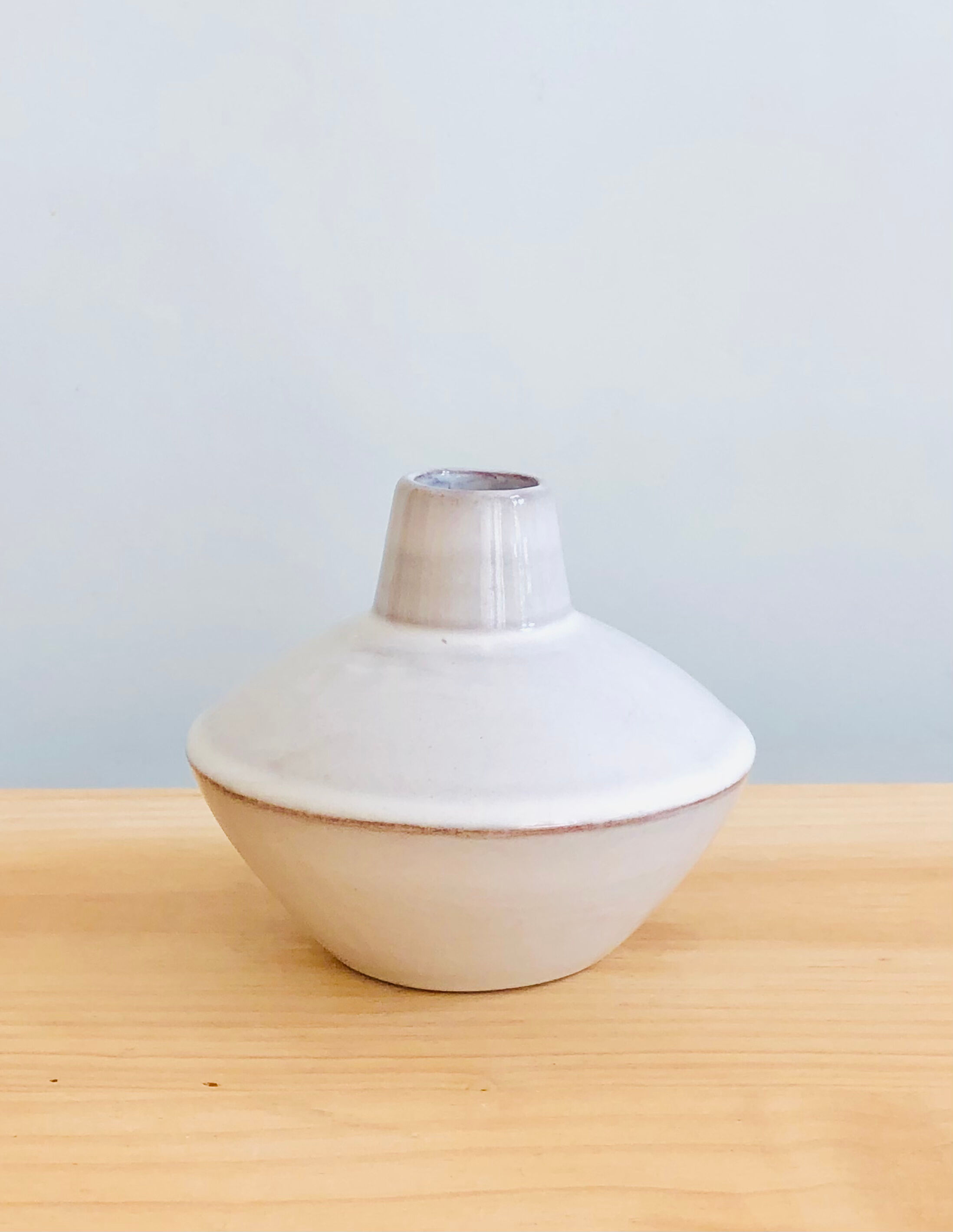 White enamelled terracotta vase