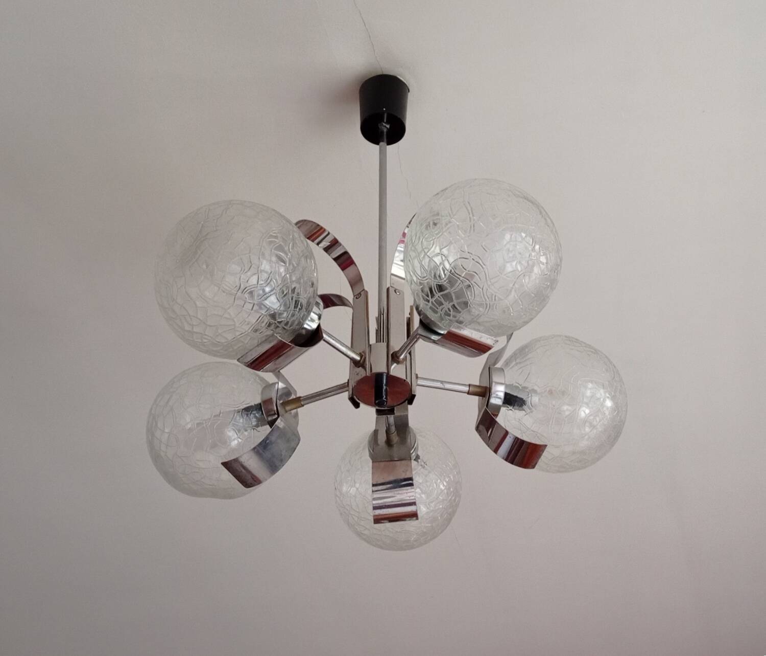 Vintage chandelier with glass globes and chrome steel
