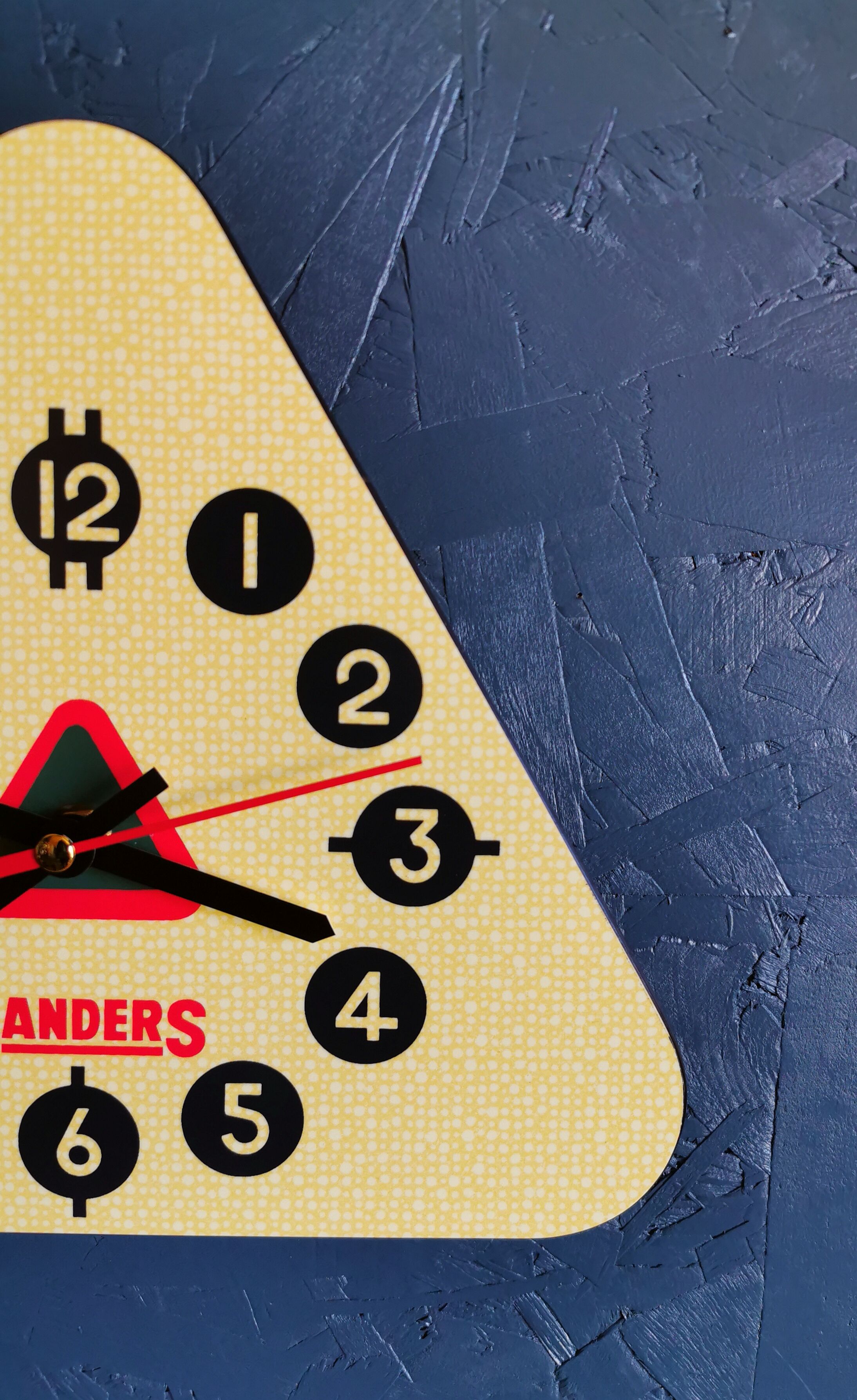 Vintage formica clock triangular silent wall clock "Sanders yellow"