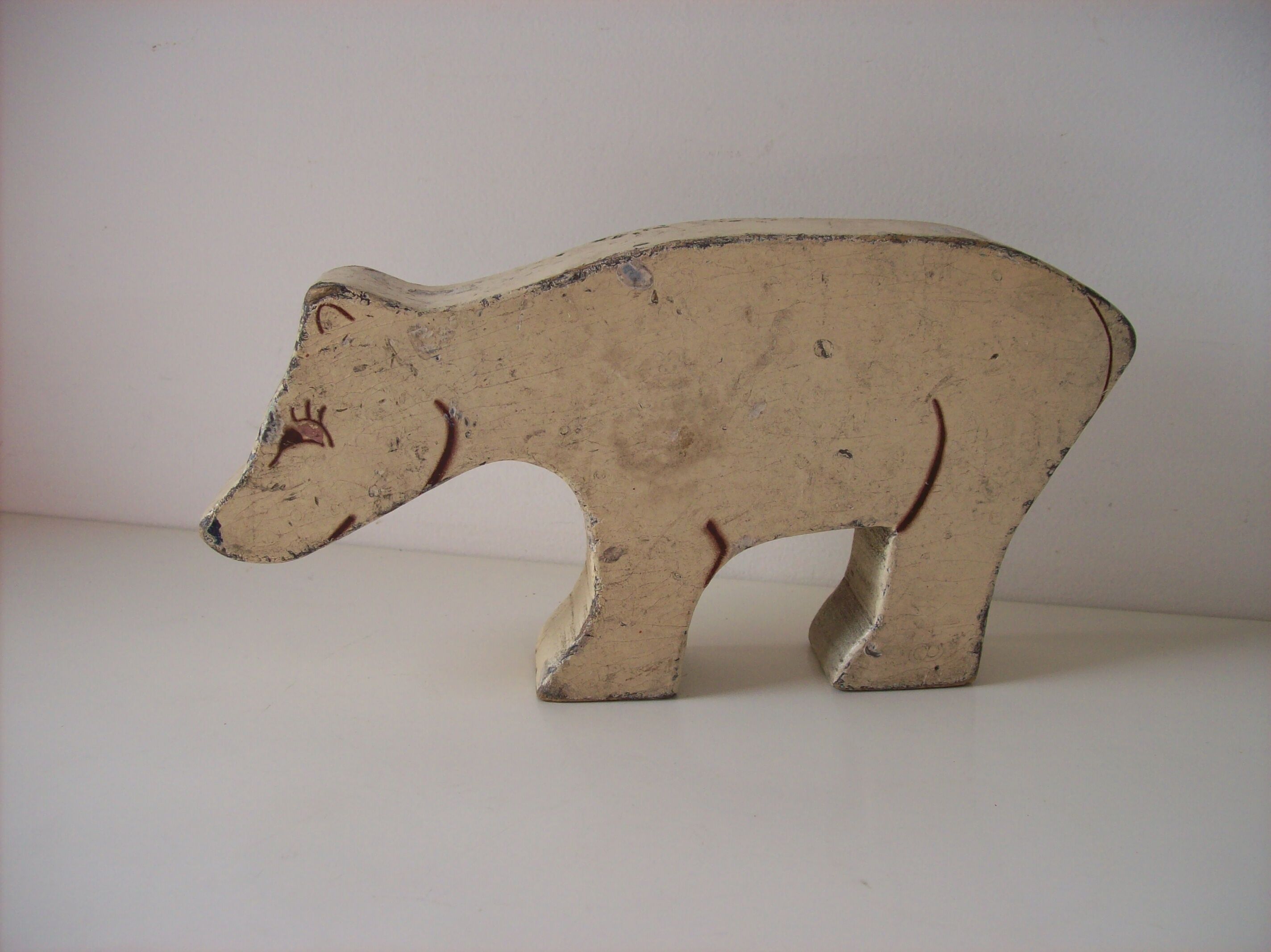 Wooden old toy bear