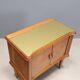Pair of wooden and glass bedside tables from the 1950s.