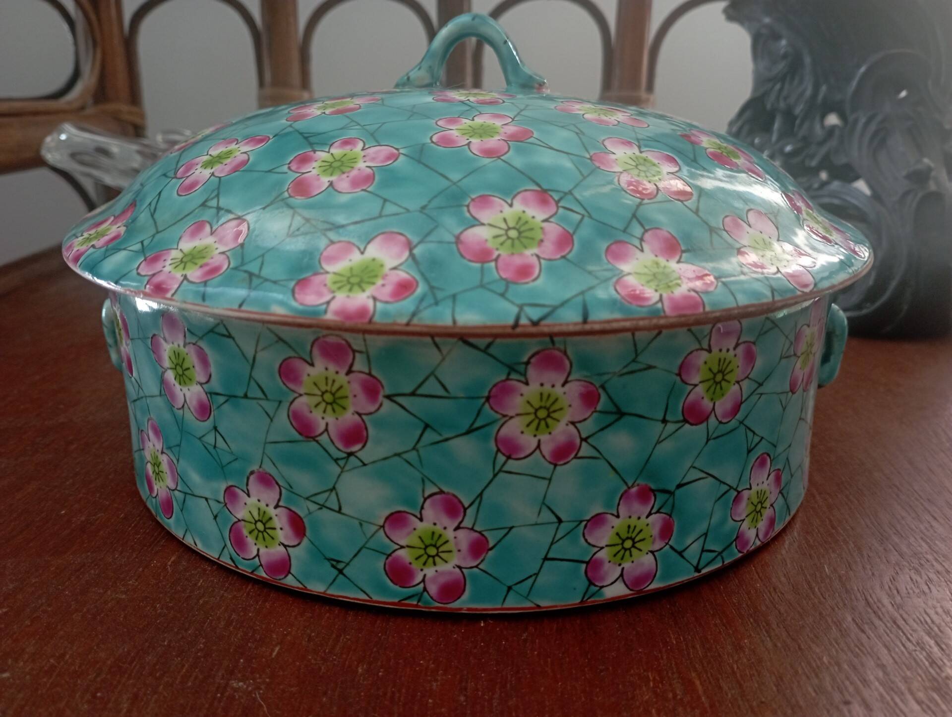 Old glazed ceramic covered pot