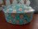 Old glazed ceramic covered pot