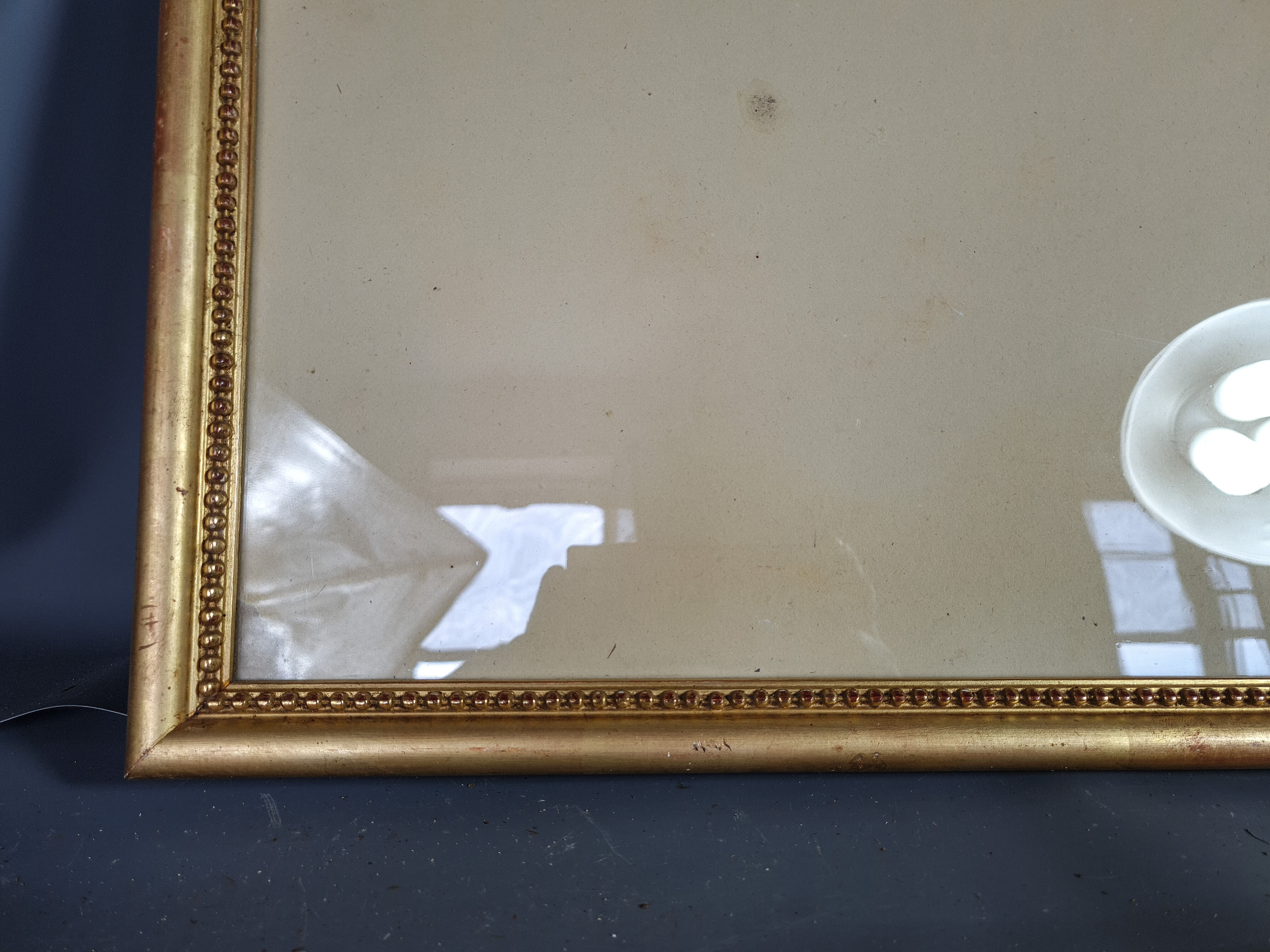 Old frame beaded decoration, gilded stucco wood