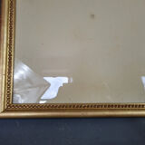 Old frame beaded decoration, gilded stucco wood