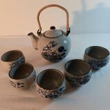 Tea service, teapot and five bowls in oriental style.