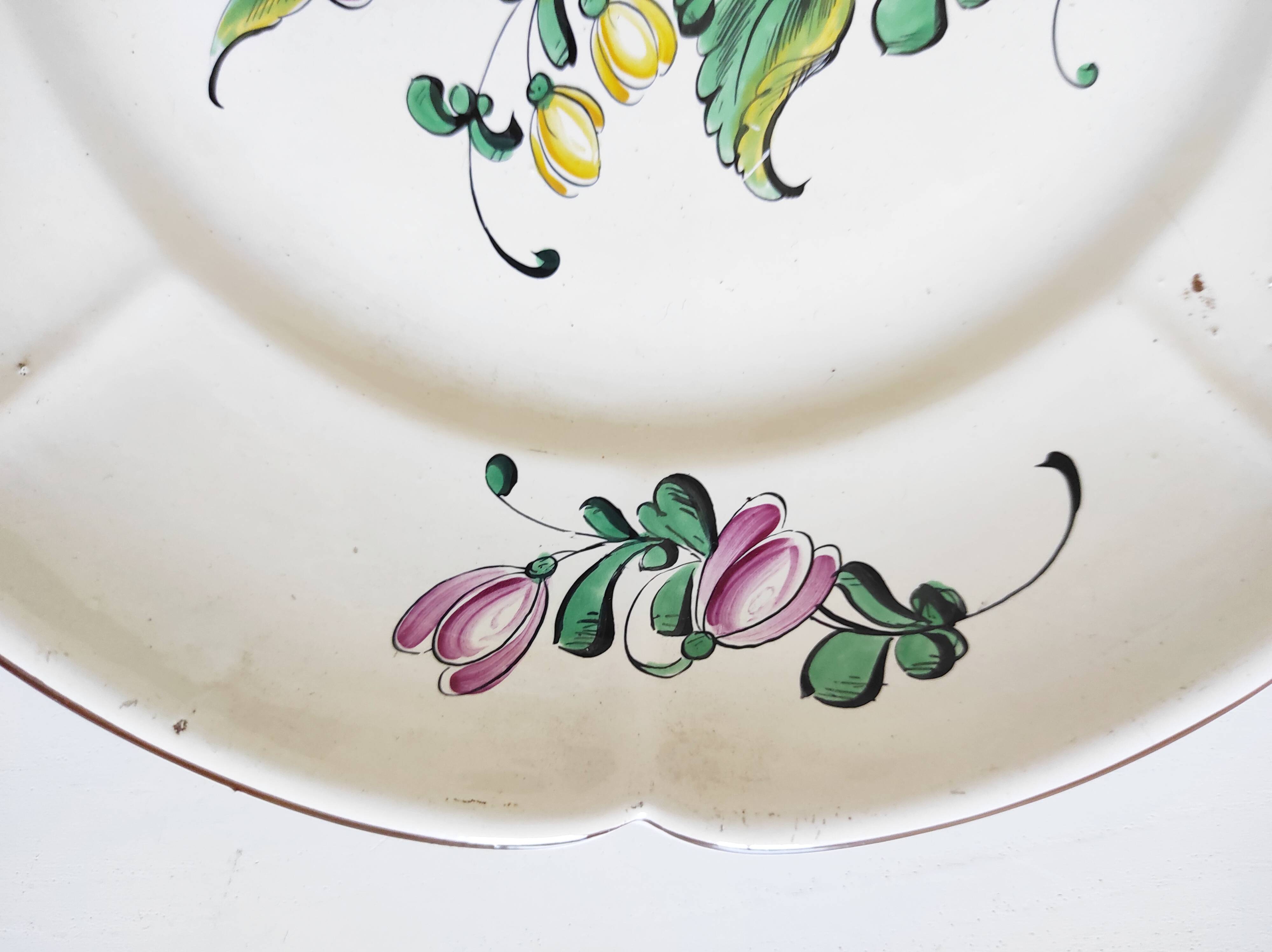 Eastern earthenware plate with flowers