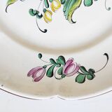 Eastern earthenware plate with flowers