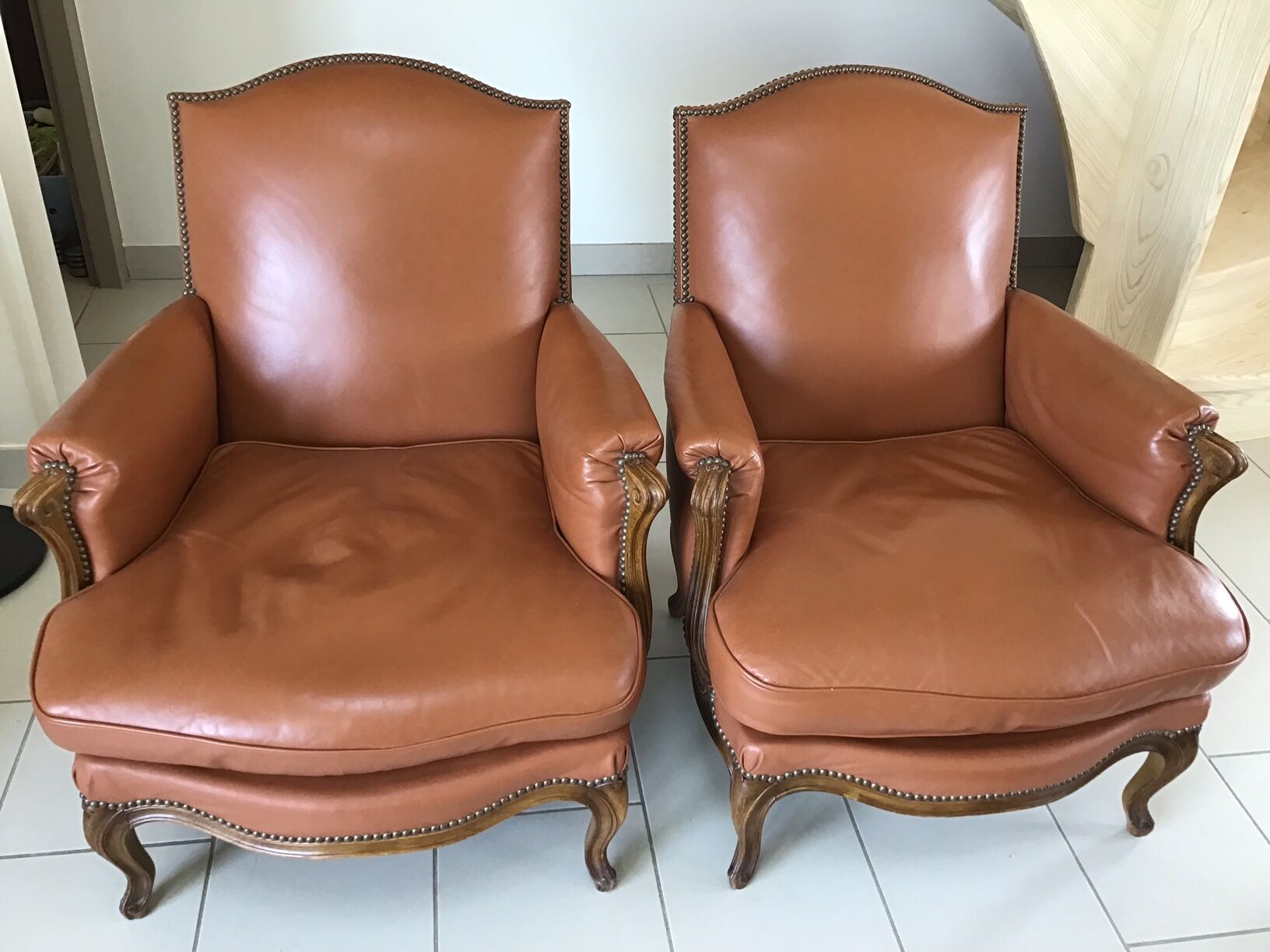 Louis VX style leather armchairs