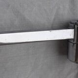 Wall lamp with articulated arm