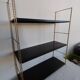 Metal string shelf