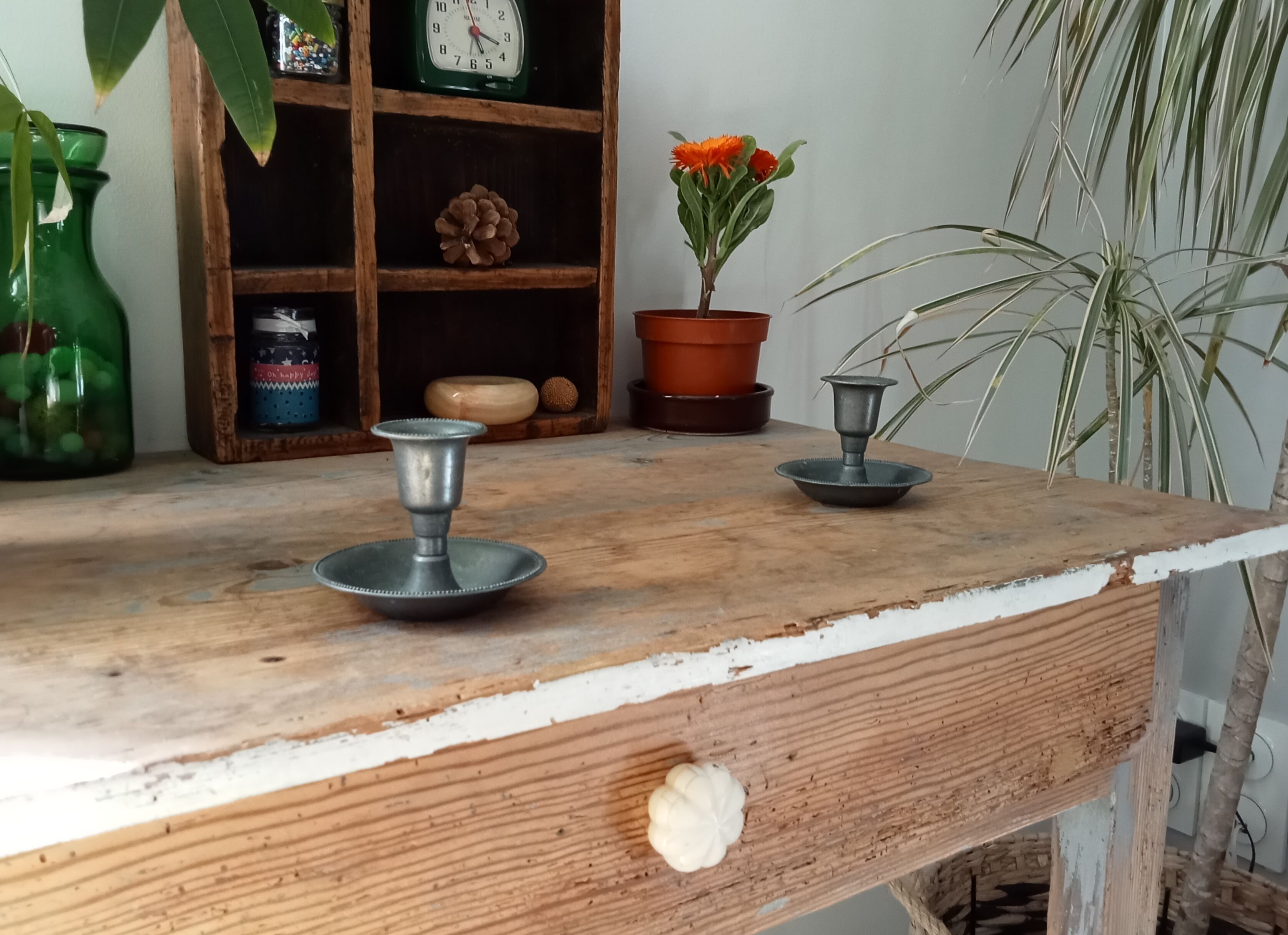 Pair of antique pewter candle holders